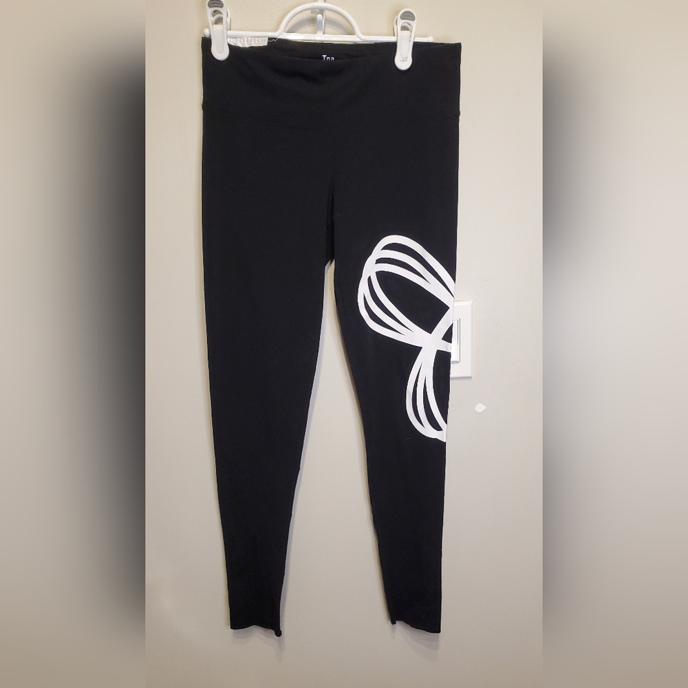 298. NWOT - TNA Spiral Leggings